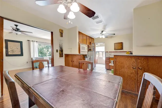 a living room with fireplace furniture and a flat screen tv
