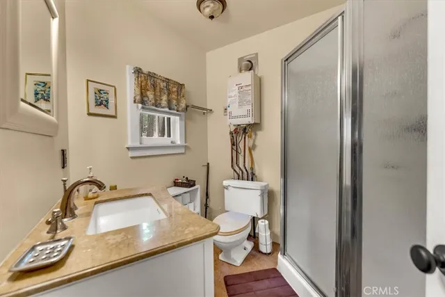 a view of a room with lots of furniture and shower