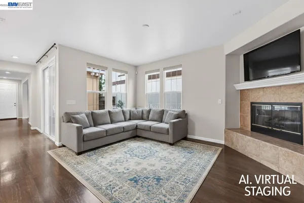 a view of staircase with railing and white walls