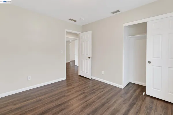 a view of an empty walk in closet