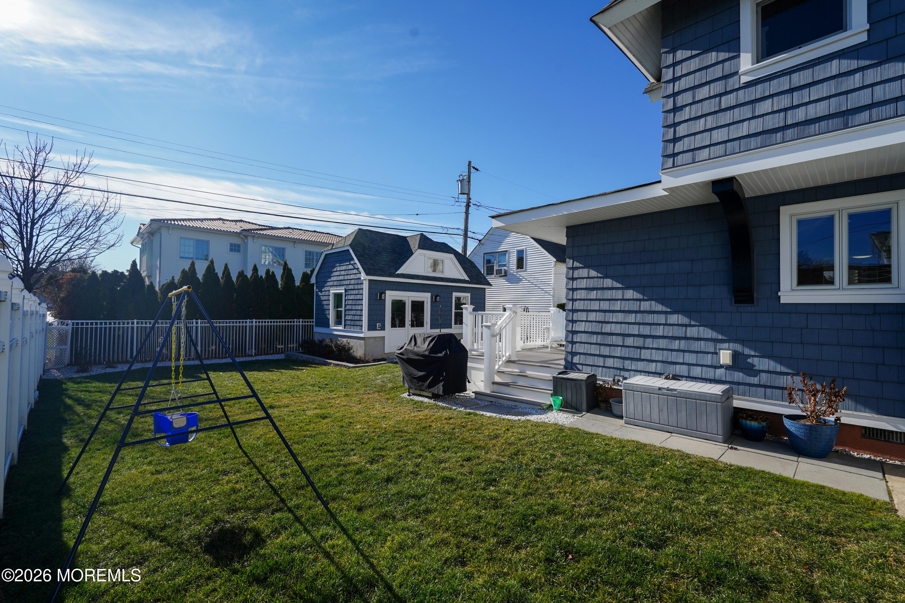 112 Euclid Avenue Allenhurst, NJ 07711 - Photo 24 of 52 a house view with a backyard space