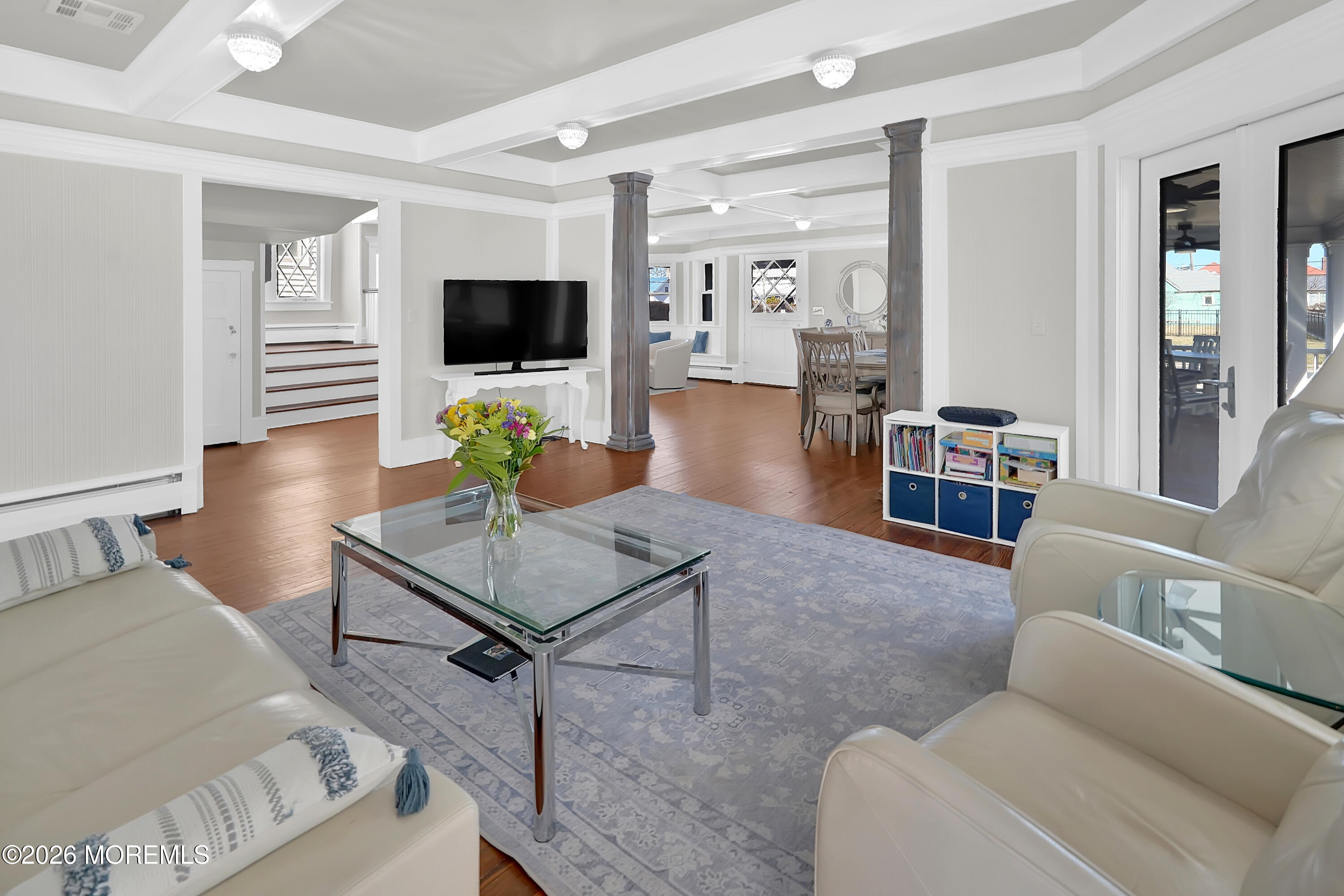 112 Euclid Avenue Allenhurst, NJ 07711 - Photo 32 of 52 a living room with furniture and a flat screen tv