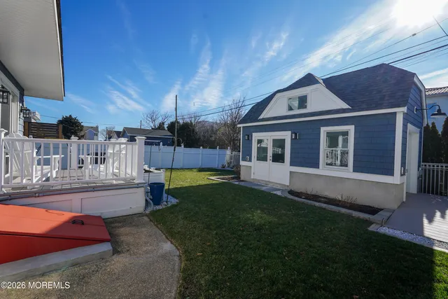 a view of a livingroom with furniture and a gym cycle