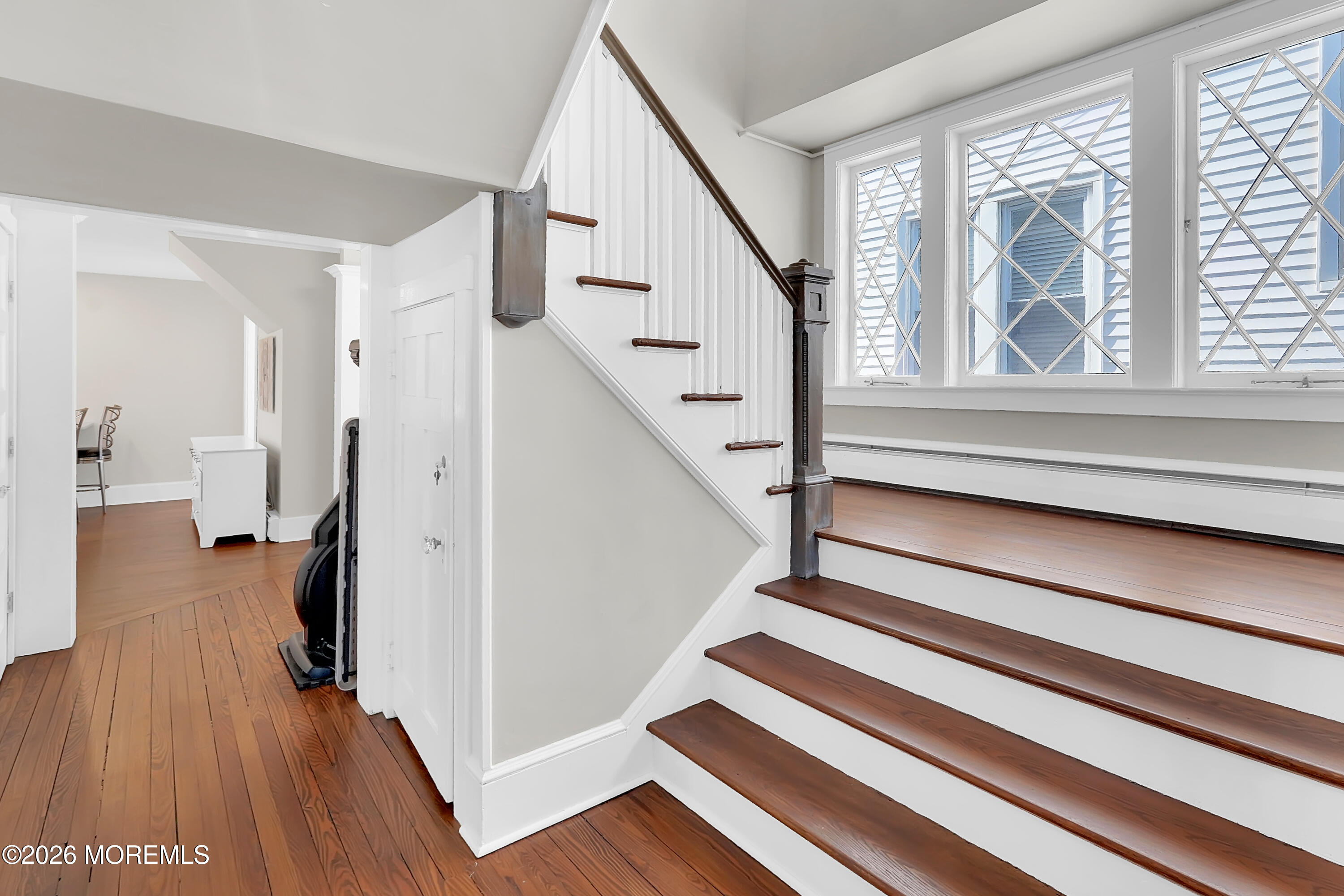 112 Euclid Avenue Allenhurst, NJ 07711 - Photo 6 of 52 a view of entryway with wooden floor and stairs