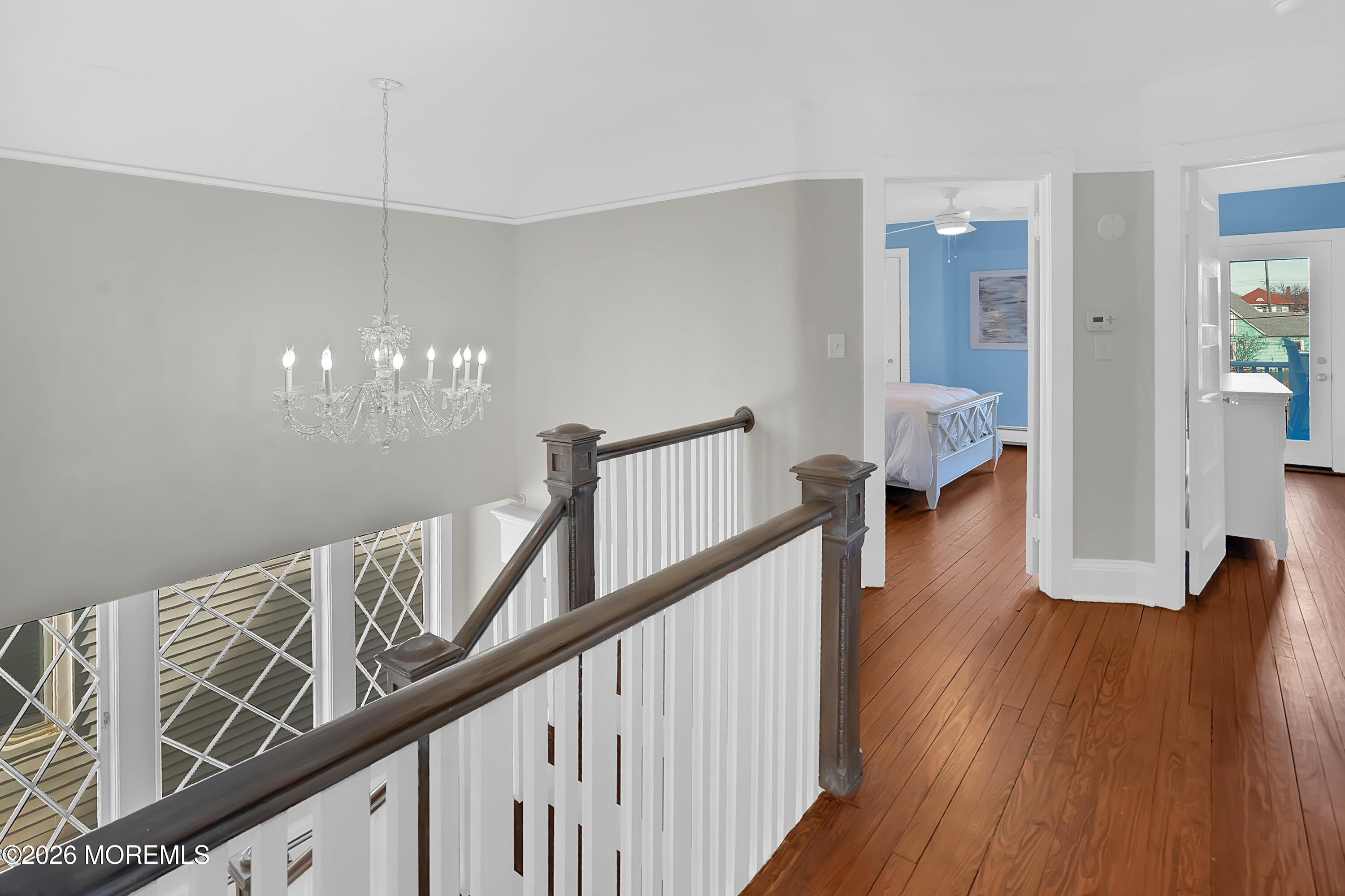 112 Euclid Avenue Allenhurst, NJ 07711 - Photo 7 of 52 a view of a hallway with wooden floor and staircase