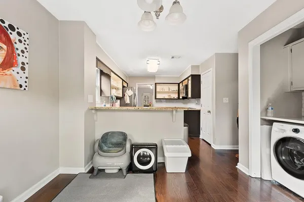 a view of livingroom with furniture and wooden floor