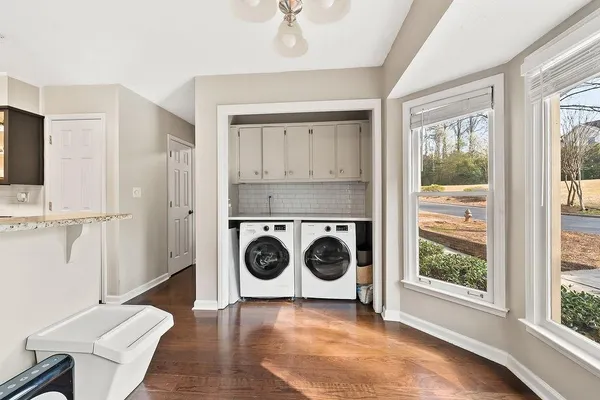 a view of a livingroom with furniture window and outside view