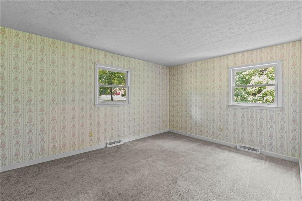 137 Roxdale Place Roxboro, NC 27574 - Photo 22 of 30 an empty room with windows