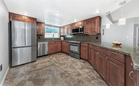 $589,900 | 9407 Laura Anne Drive, Seminole, FL 33776