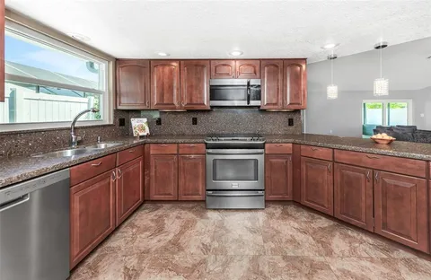$589,900 | 9407 Laura Anne Drive, Seminole, FL 33776