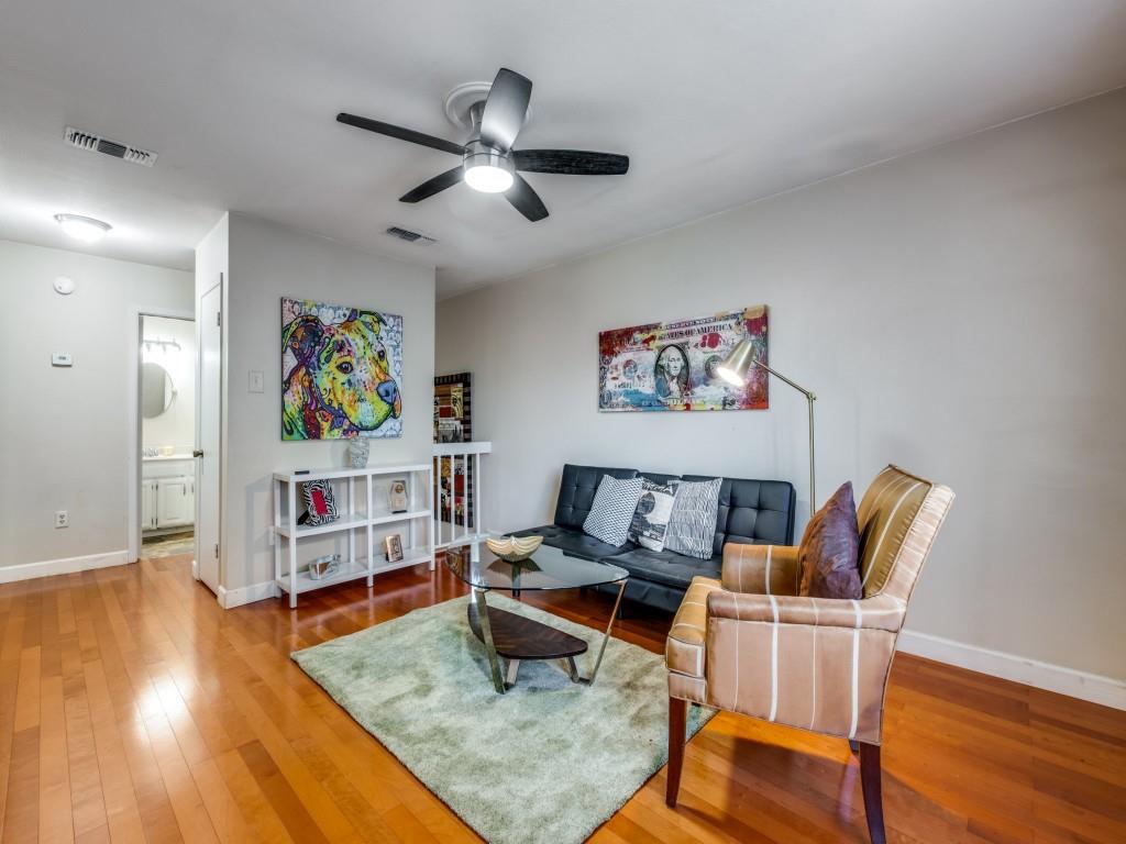 5626 Preston Oaks Road, Unit 46C Dallas, TX 75254 - Photo 9 of 25 a living room with furniture and wooden floor