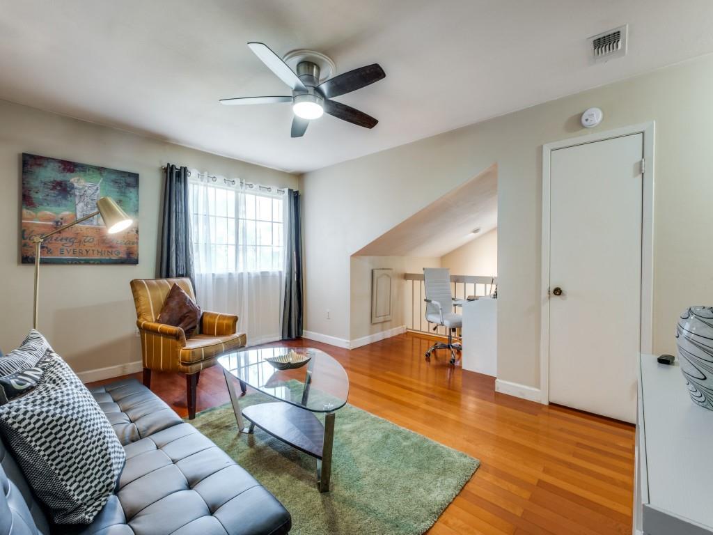5626 Preston Oaks Road, Unit 46C Dallas, TX 75254 - Photo 19 of 25 a living room with furniture and a wooden floor