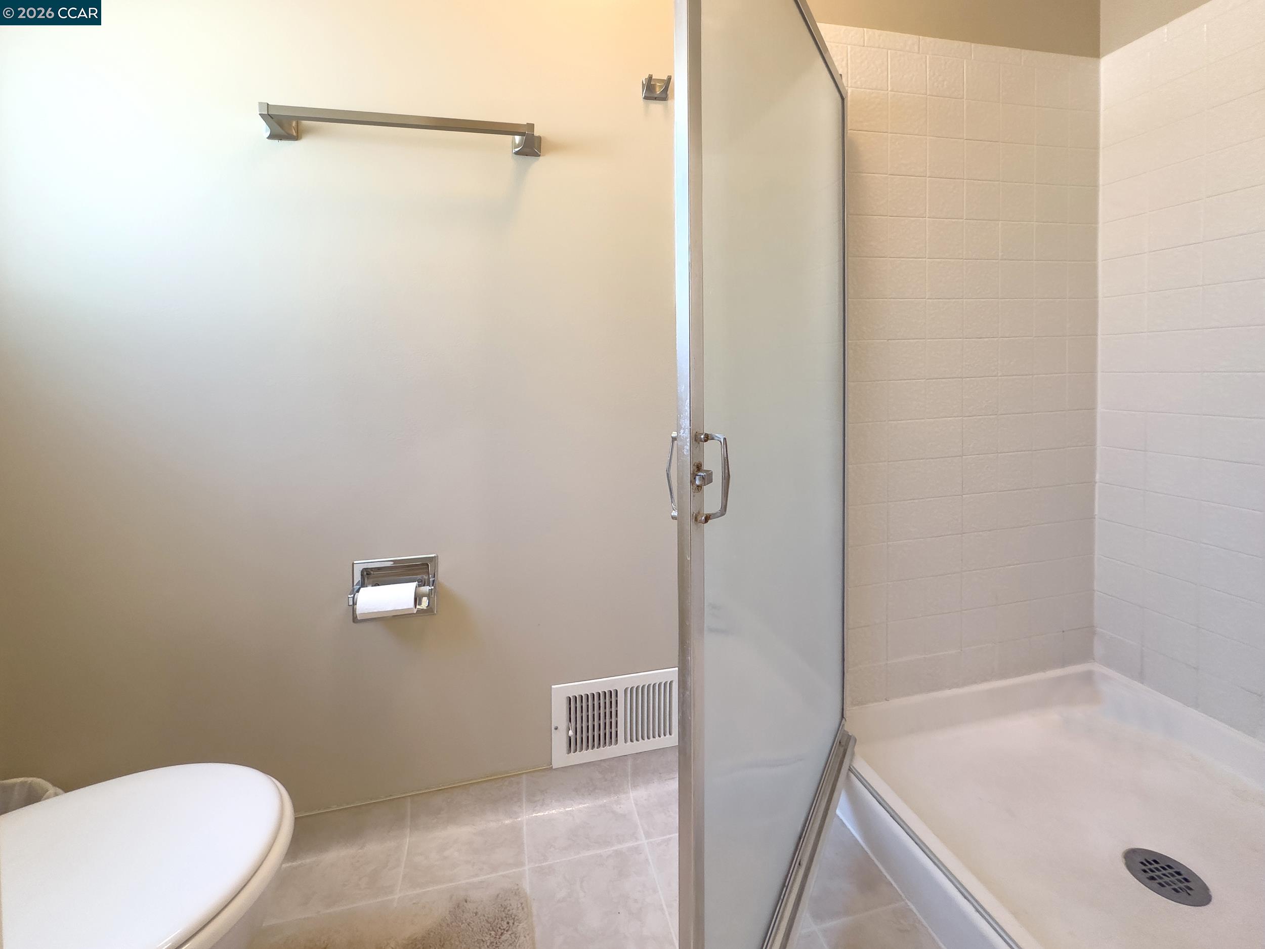 314 Semillon Circle Clayton, CA 94517 - Photo 22 of 38 a bathroom with a shower and toilet