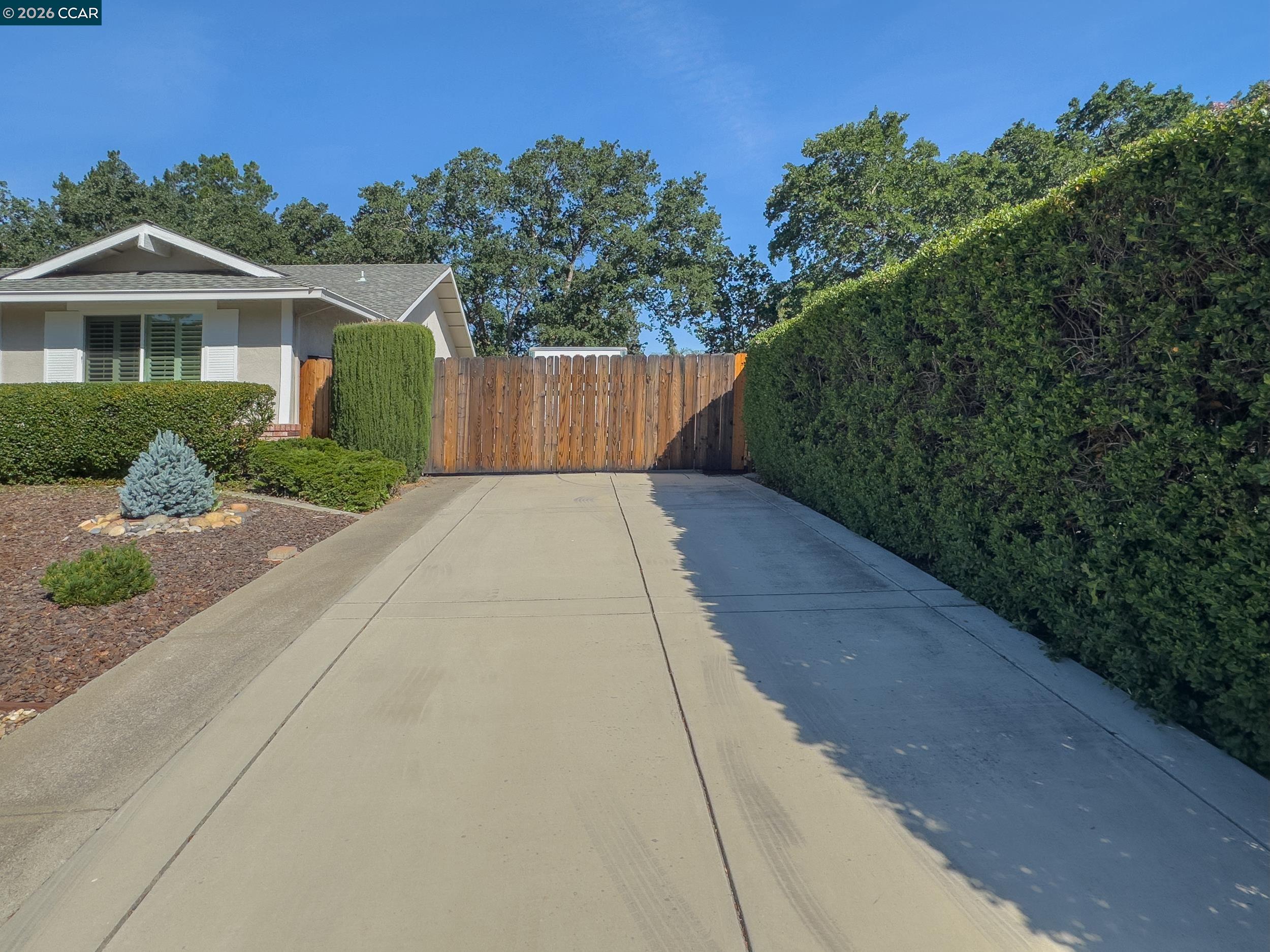 314 Semillon Circle Clayton, CA 94517 - Photo 3 of 38 a view of a house with a yard