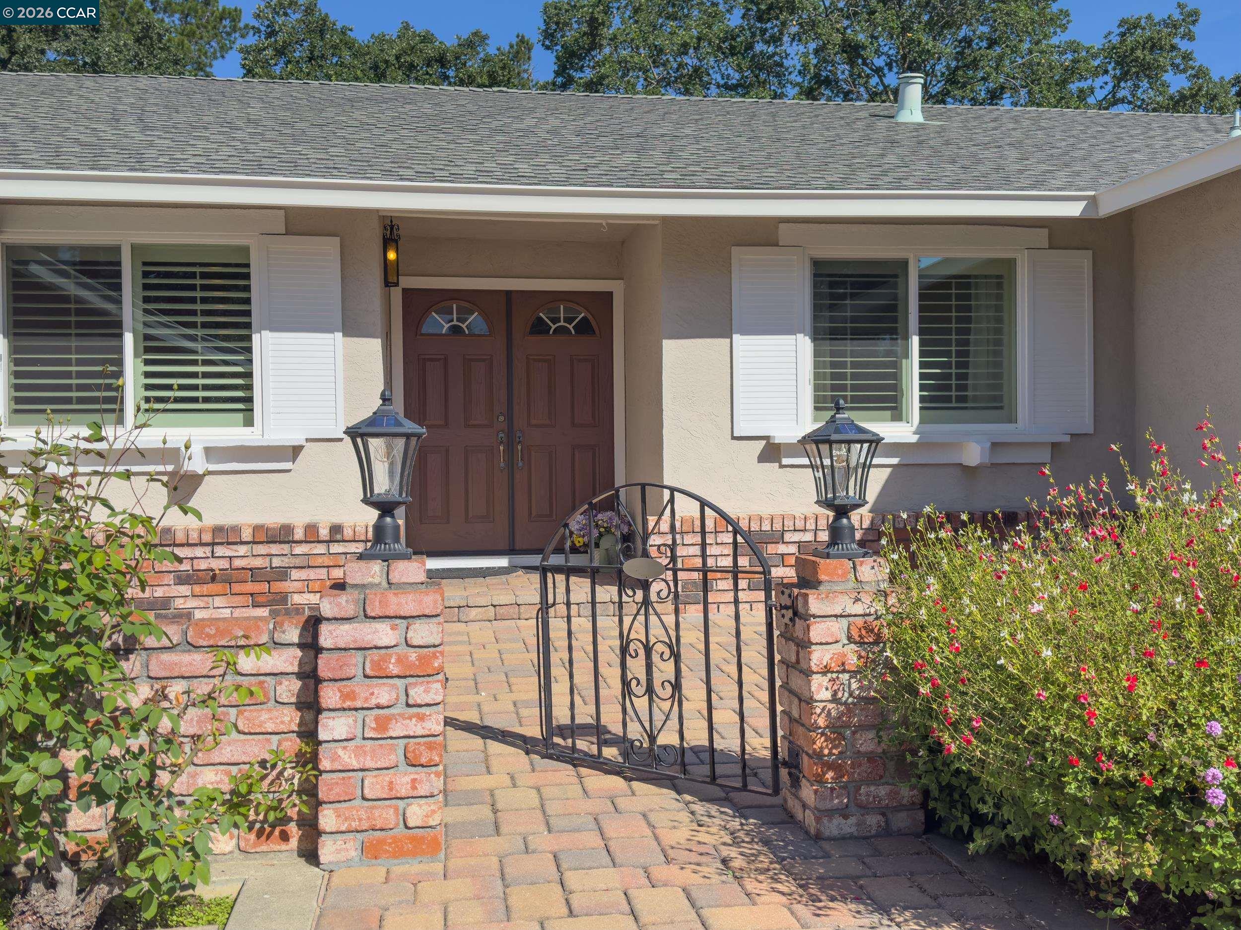 314 Semillon Circle Clayton, CA 94517 - Photo 5 of 38 a front view of a house with a porch