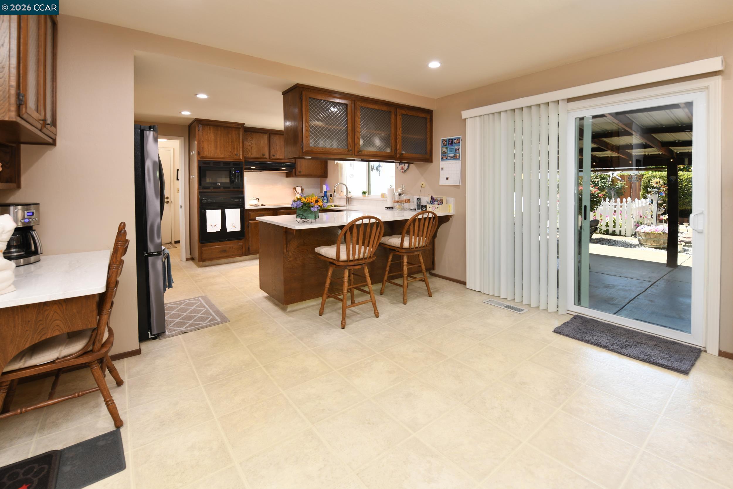 314 Semillon Circle Clayton, CA 94517 - Photo 10 of 38 a view of a dining room with furniture