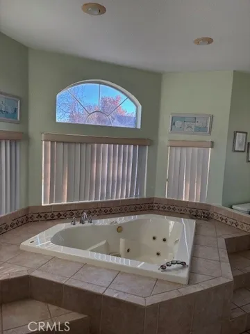 a bath tub sitting in a bathroom