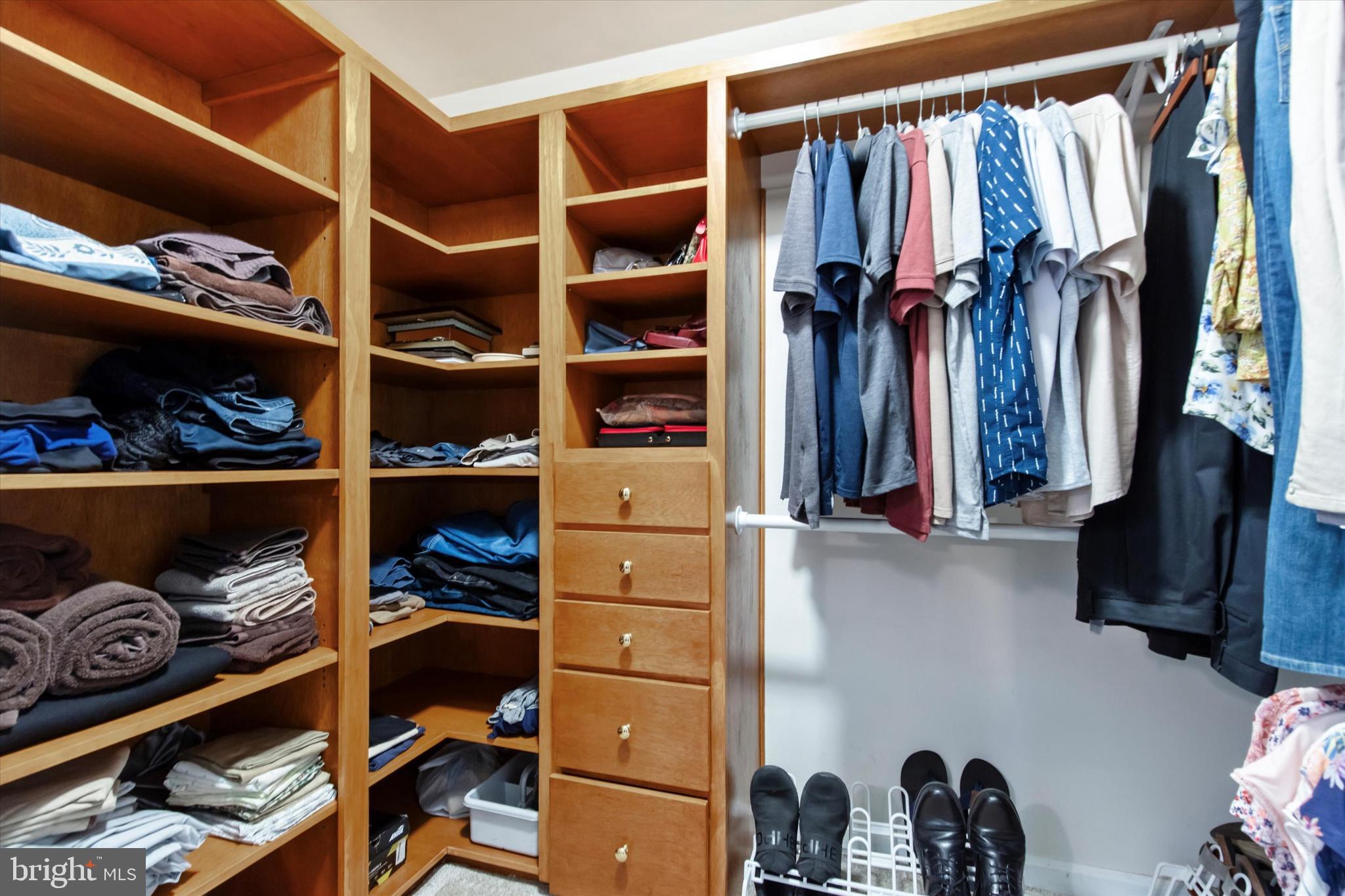 1992 Keswick Way Eagleville, PA 19403 - Photo 12 of 26 a view of walk in closet with clothes and shoes