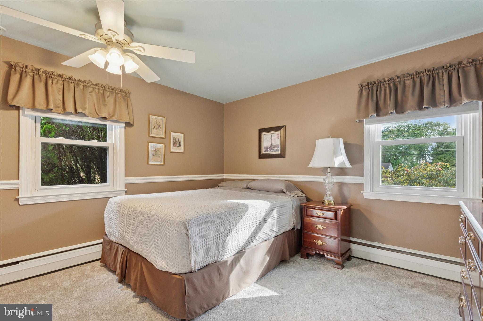 1992 Keswick Way Eagleville, PA 19403 - Photo 16 of 26 a bed room with a bed and a window