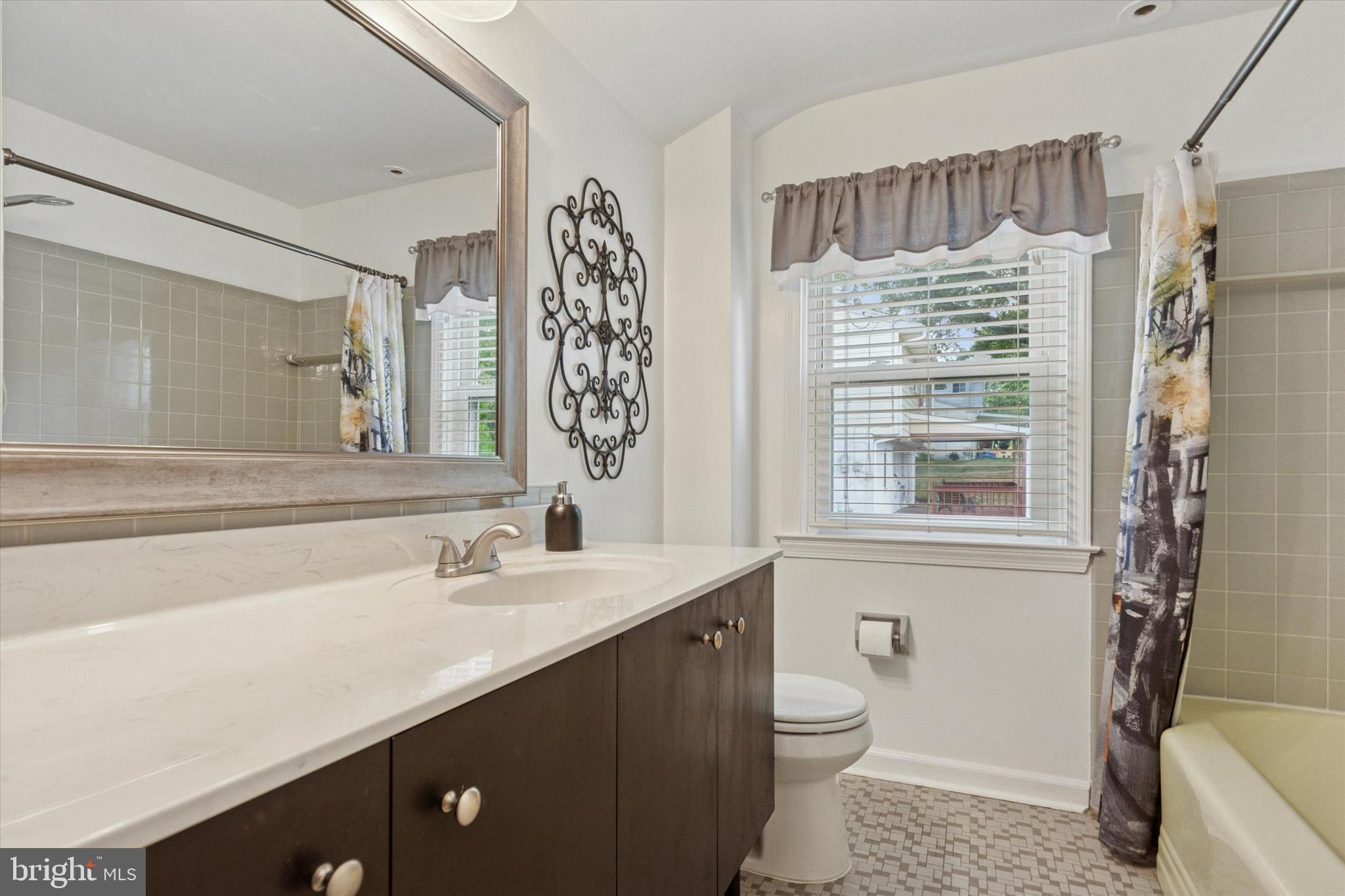 1992 Keswick Way Eagleville, PA 19403 - Photo 17 of 26 a bathroom with a sink a toilet and shower