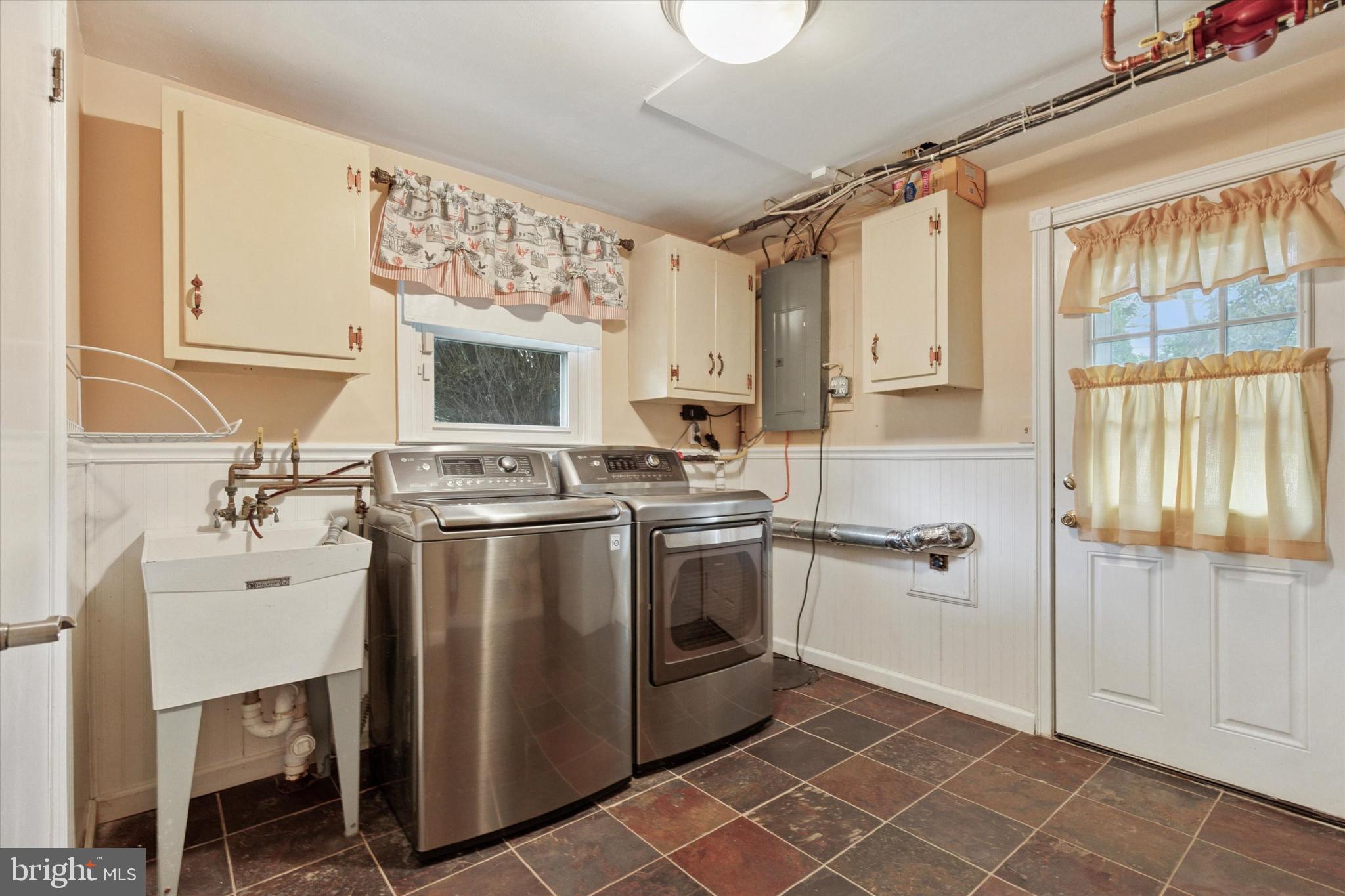 1992 Keswick Way Eagleville, PA 19403 - Photo 19 of 26 a kitchen with a stove a sink and a refrigerator