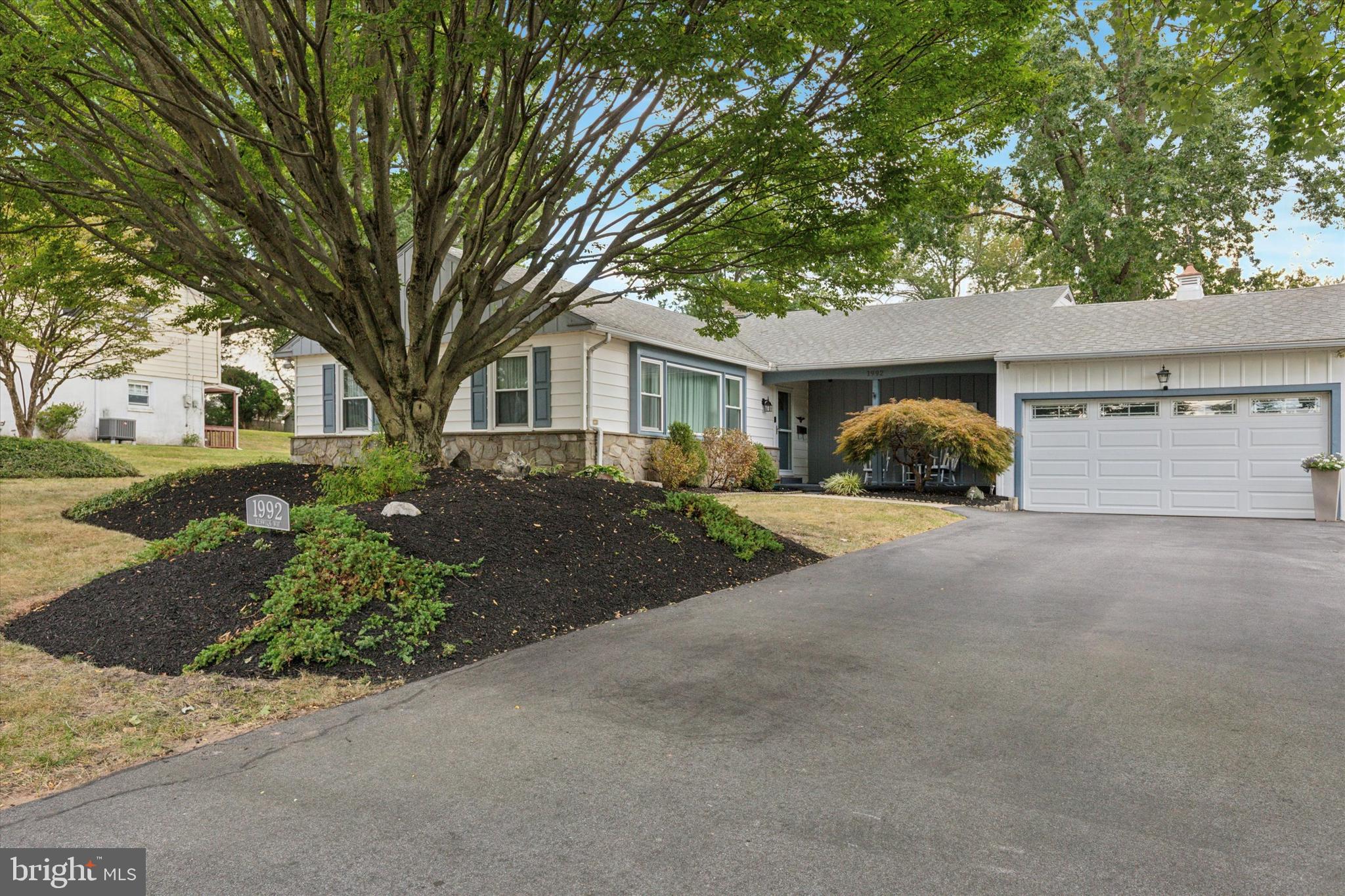 1992 Keswick Way Eagleville, PA 19403 - Photo 2 of 26 a house with trees in front of it