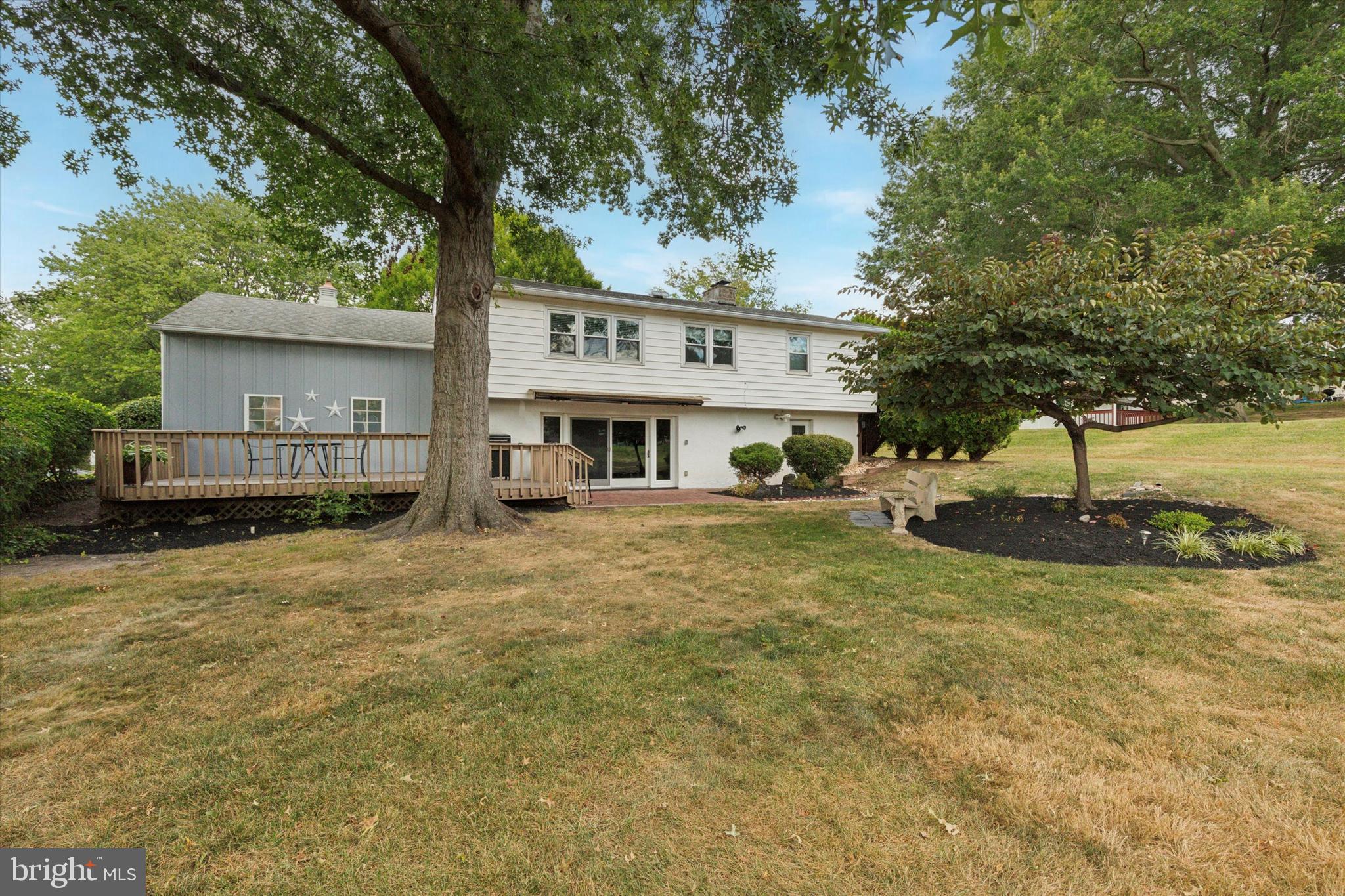 1992 Keswick Way Eagleville, PA 19403 - Photo 25 of 26 a view of a house with backyard and sitting area