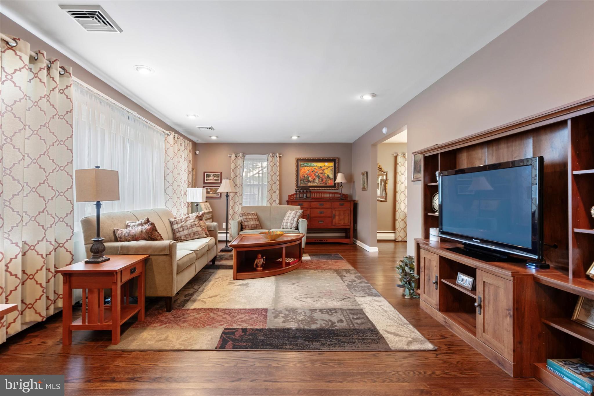 1992 Keswick Way Eagleville, PA 19403 - Photo 4 of 26 a living room with furniture and a flat screen tv