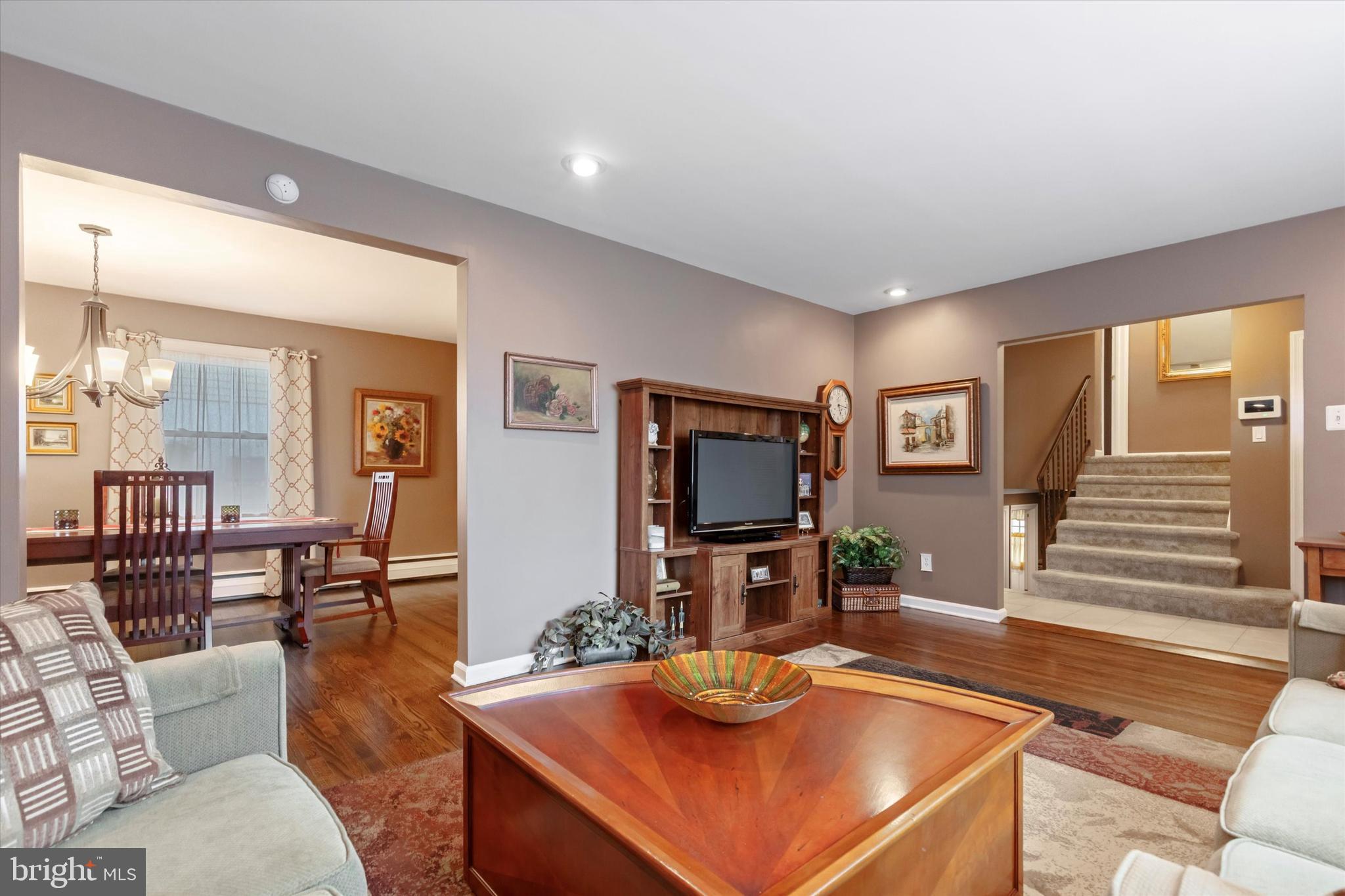 1992 Keswick Way Eagleville, PA 19403 - Photo 5 of 26 a living room with furniture and a flat screen tv