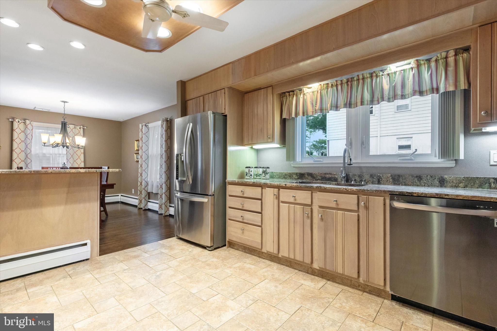 1992 Keswick Way Eagleville, PA 19403 - Photo 8 of 26 a kitchen with stainless steel appliances granite countertop a refrigerator and a sink