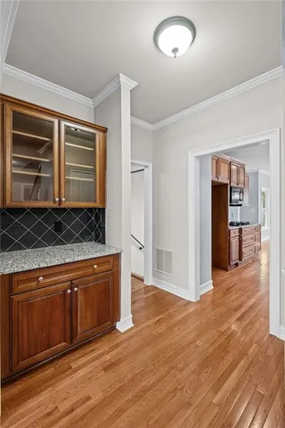 a living room with wooden floor