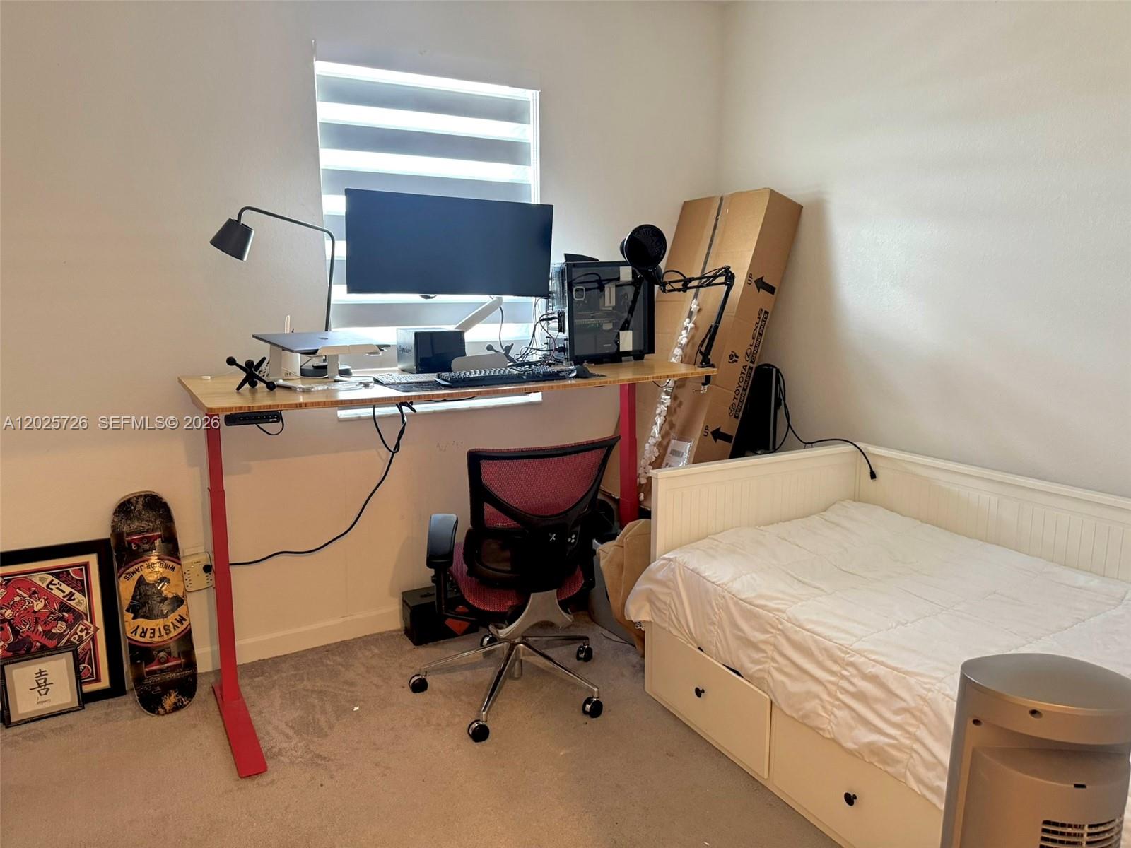 10020 Southwest 228th Terrace Miami, FL 33190 - Photo 15 of 22 a room with gym equipment and a mirror