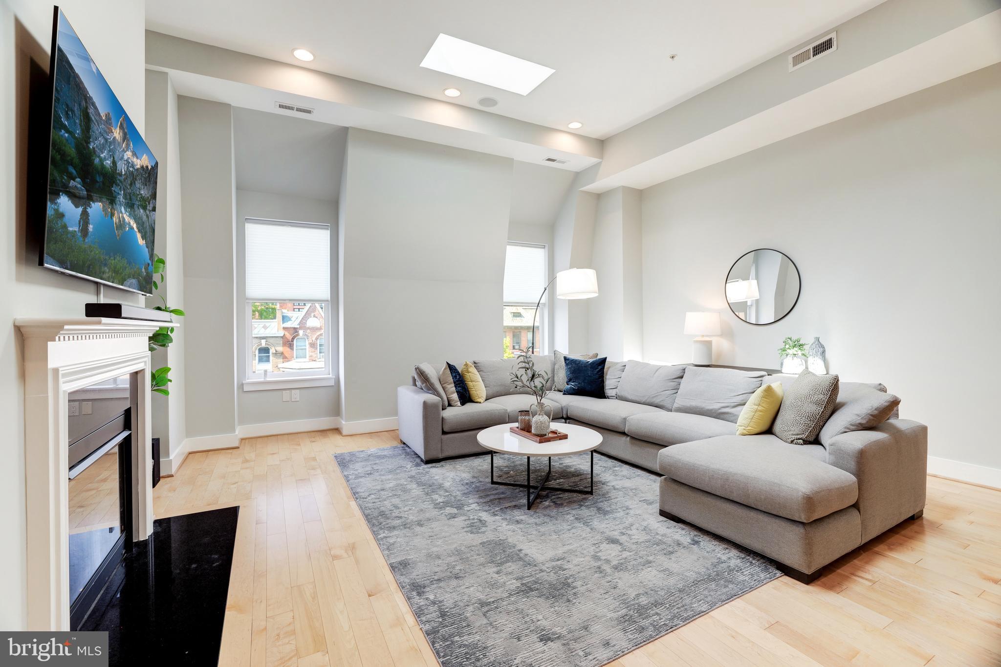 2435 Ontario Road Northwest, Unit 4 Washington, DC 20009 - Photo 5 of 20 Living Room with skylights and tall ceilings