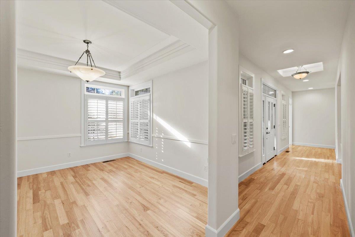 14622 Banner Lava Cap Road Nevada City, CA 95959 - Photo 23 of 66 a view of empty room with wooden floor and fan