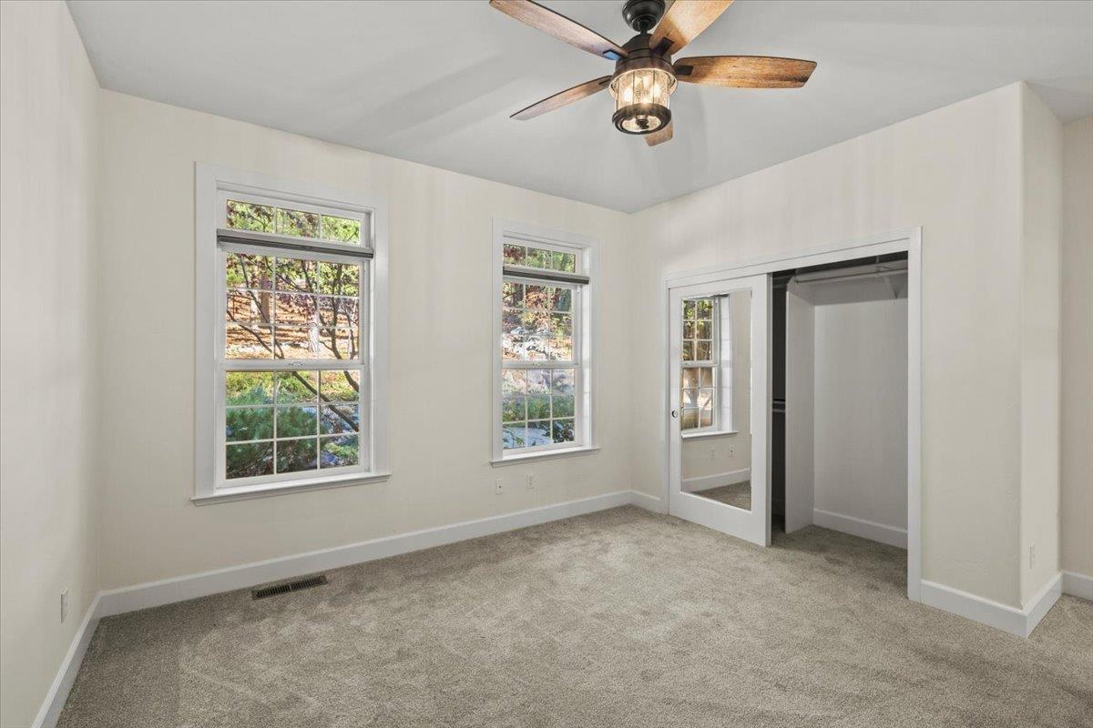 14622 Banner Lava Cap Road Nevada City, CA 95959 - Photo 46 of 66 a view of an empty room with a window