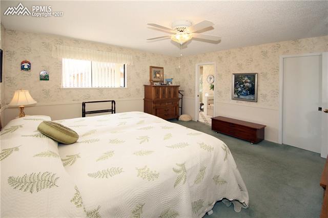 3103 Springdowns Place Colorado Springs, CO 80906 - Photo 20 of 36 Master Bedroom