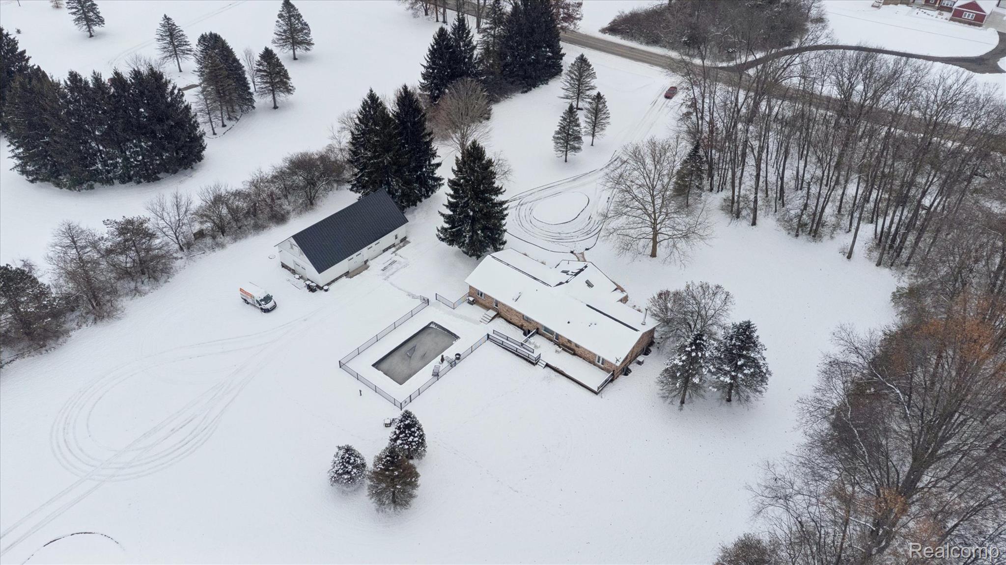 187 Darwin Road Pinckney, MI 48169 - Photo 65 of 71 View of snowy aerial view
