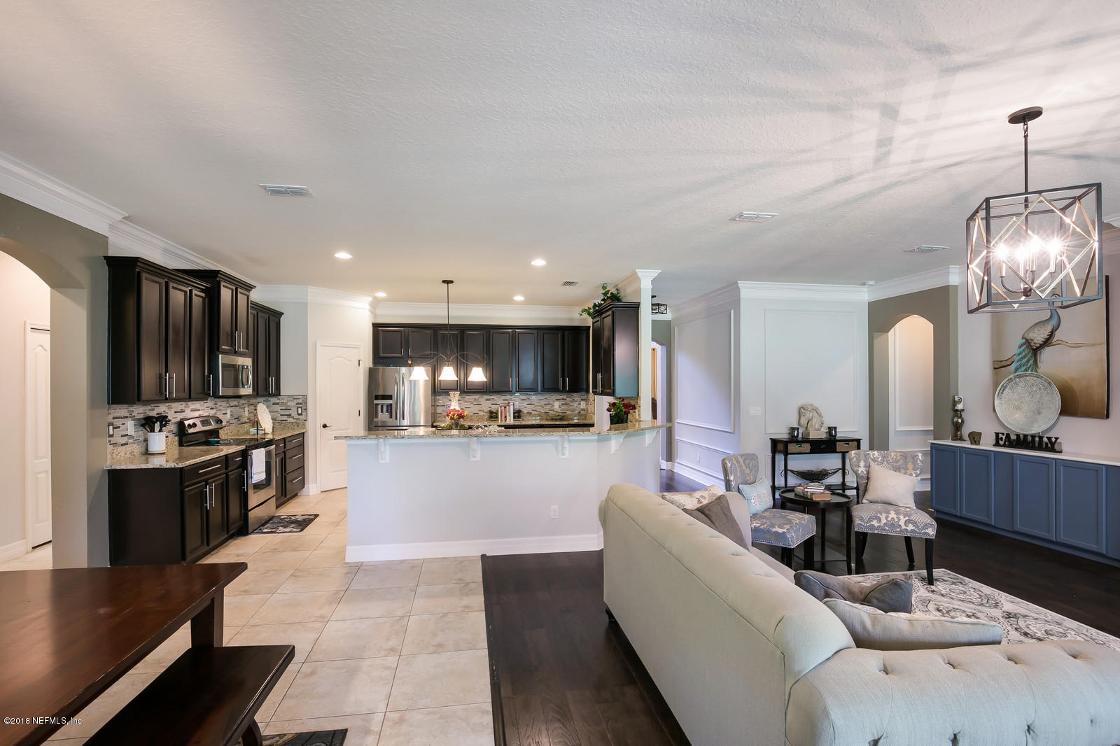 211 Esmeralda Road St. Augustine, FL 32095 - Photo 26 of 72 23- Great Room to kitchen