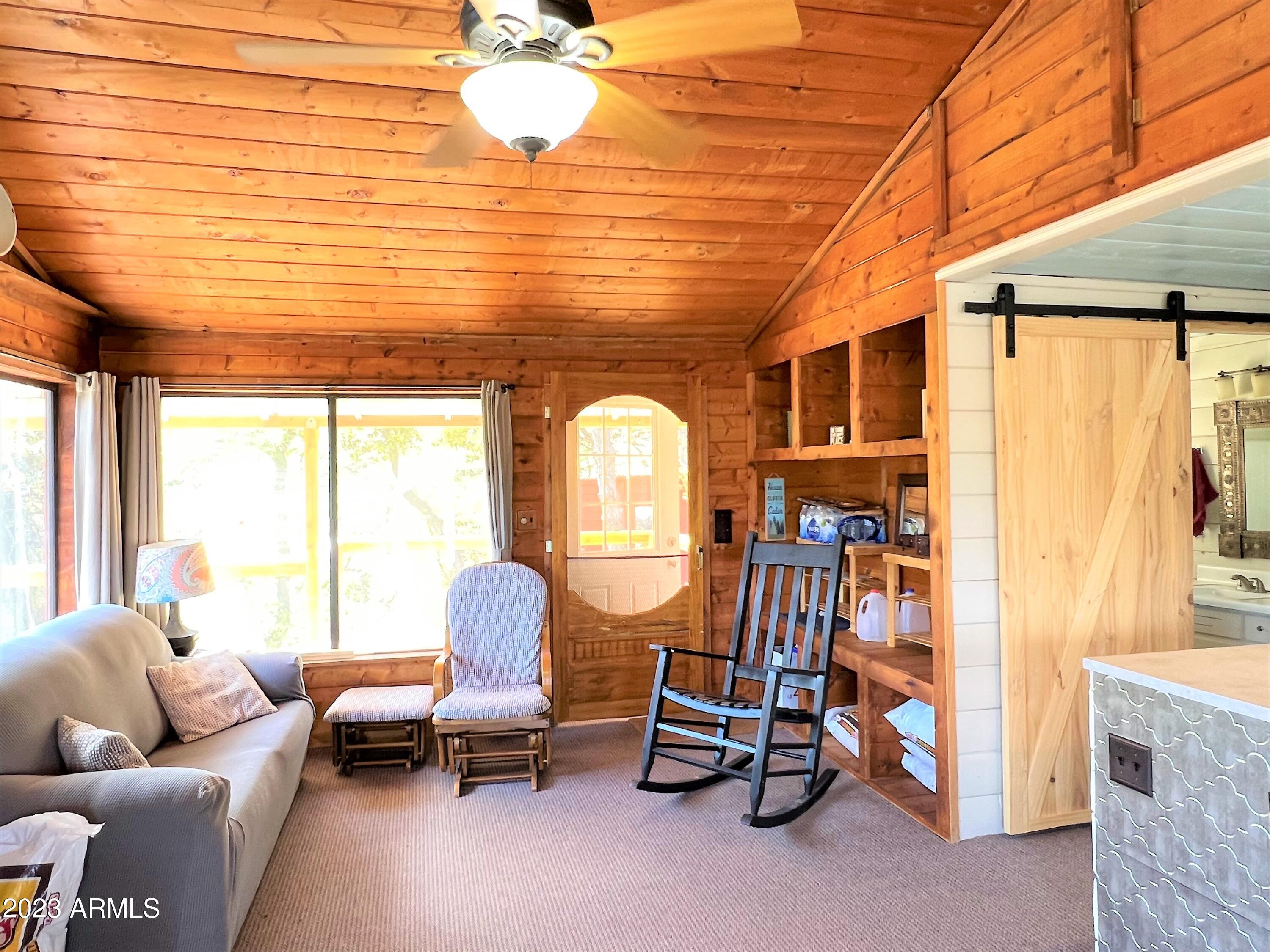 23659 Sunny South Road Crown King, AZ 86343 - Photo 20 of 29 a living room with furniture and a window