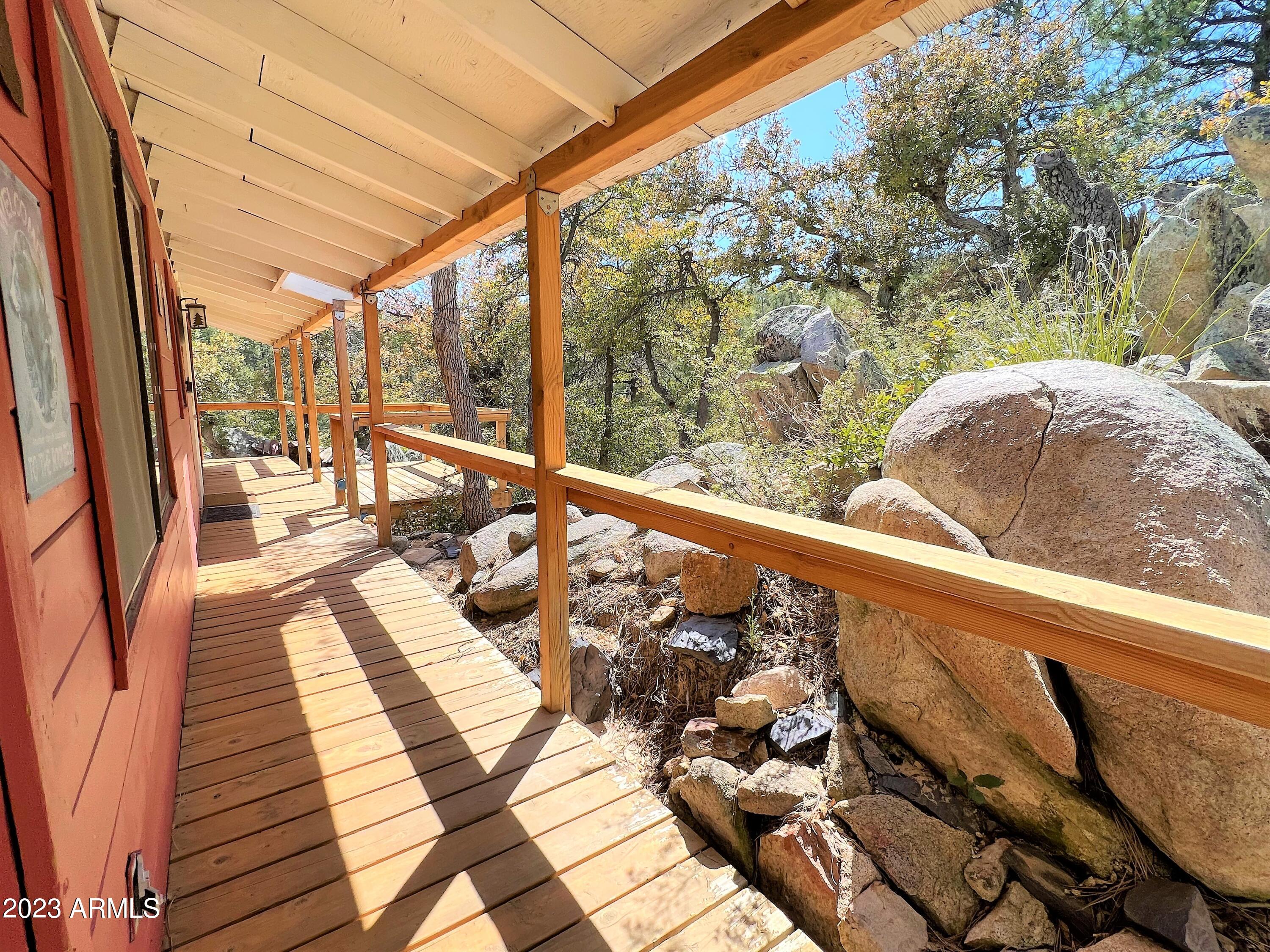 23659 Sunny South Road Crown King, AZ 86343 - Photo 24 of 29 a view of balcony with wooden floor and seating space
