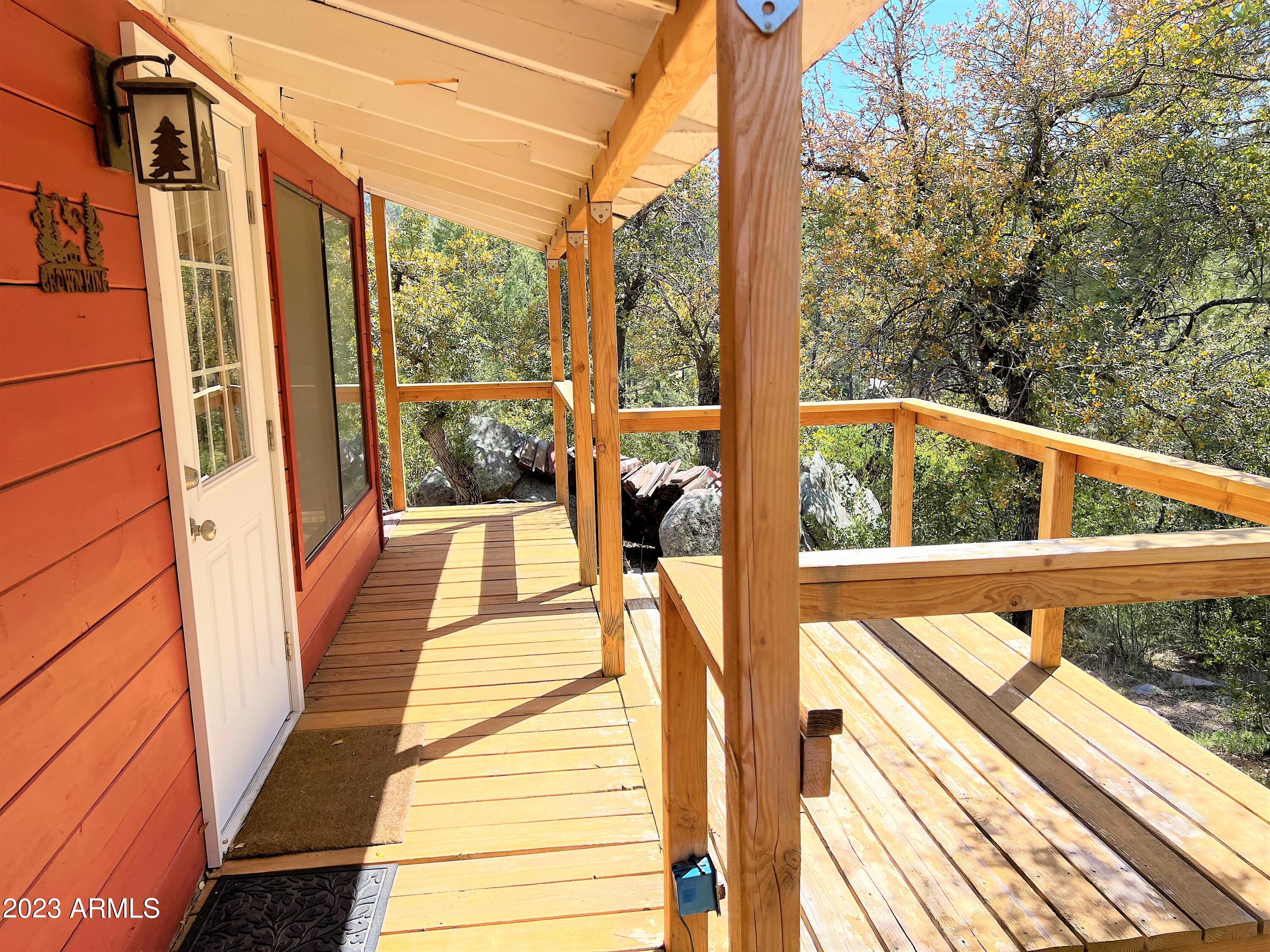 23659 Sunny South Road Crown King, AZ 86343 - Photo 10 of 29 a view of a balcony with wooden floor