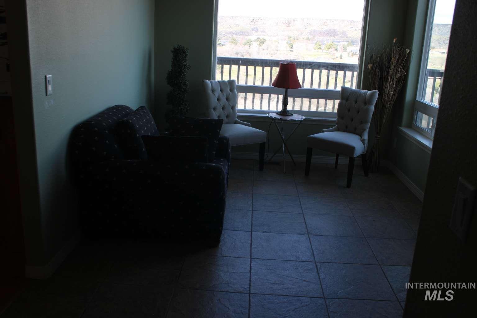 1422 River View Lane Buhl, ID 83316 - Photo 30 of 43 Living area featuring baseboards