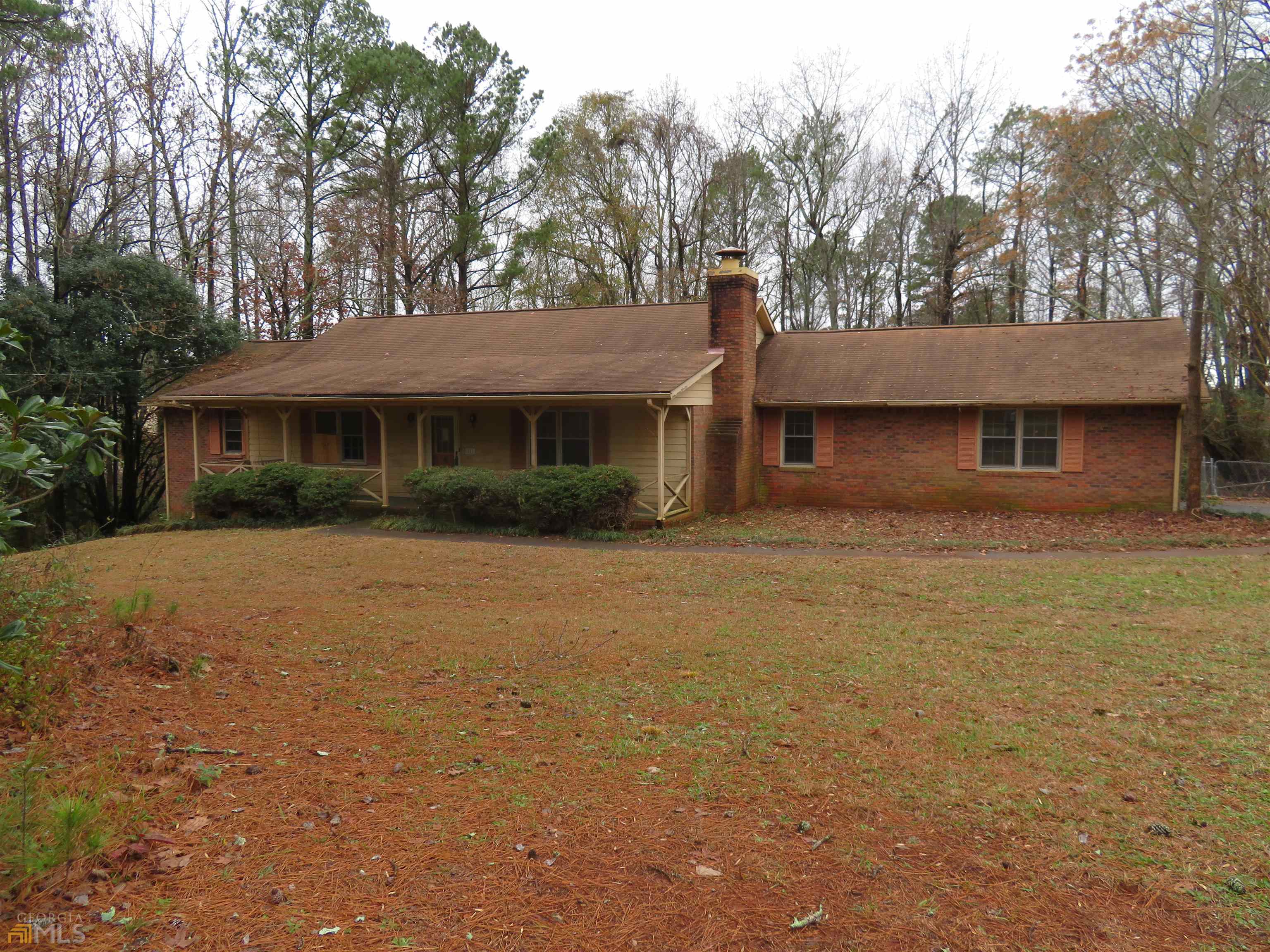 253 Austin Road Stockbridge, GA 30281 - Photo 1 of 1 a front view of a house with a garden