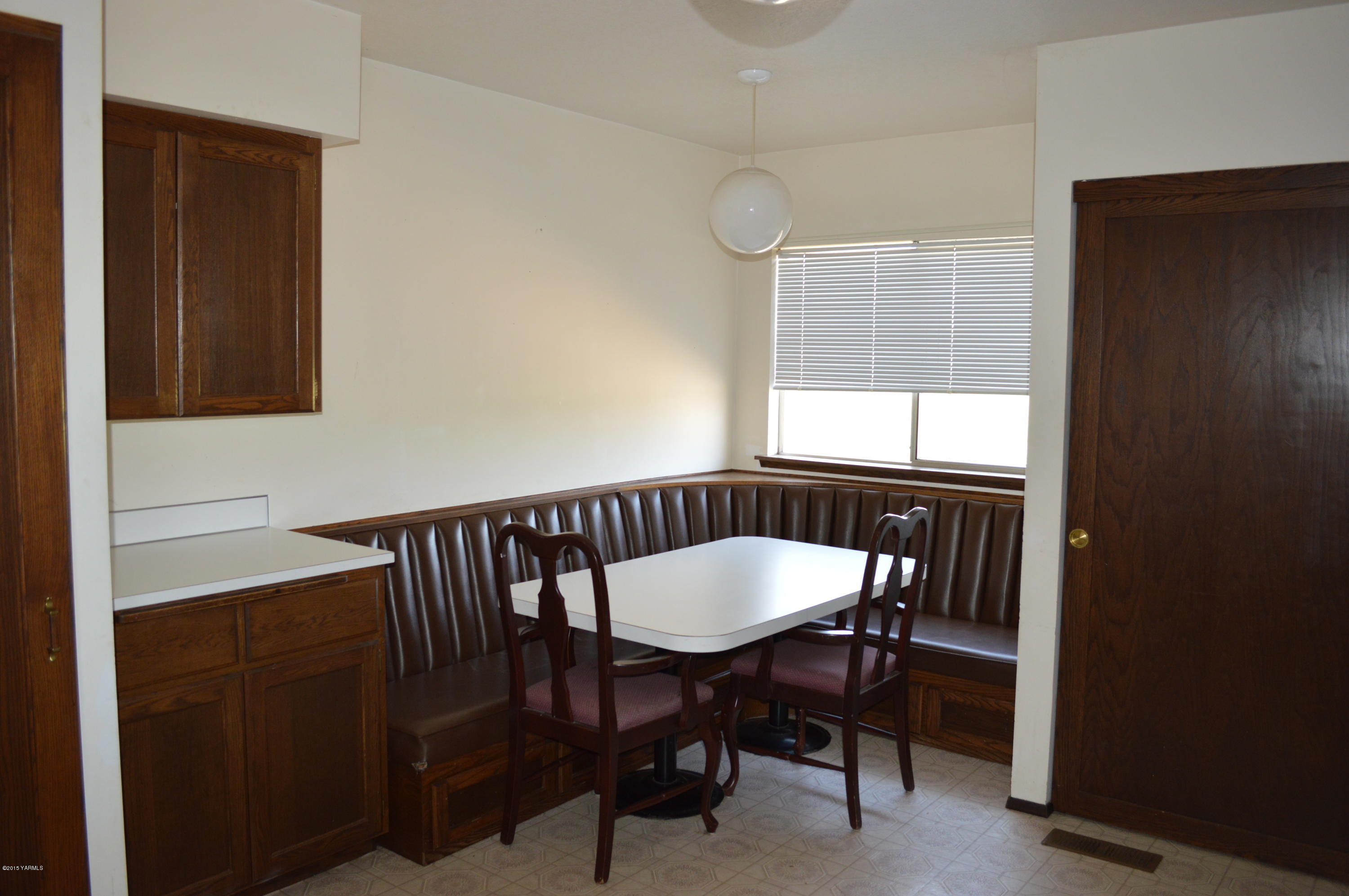 220 Martin Road Toppenish, WA 98948 - Photo 6 of 12 a view of a dining room with furniture window and outside view