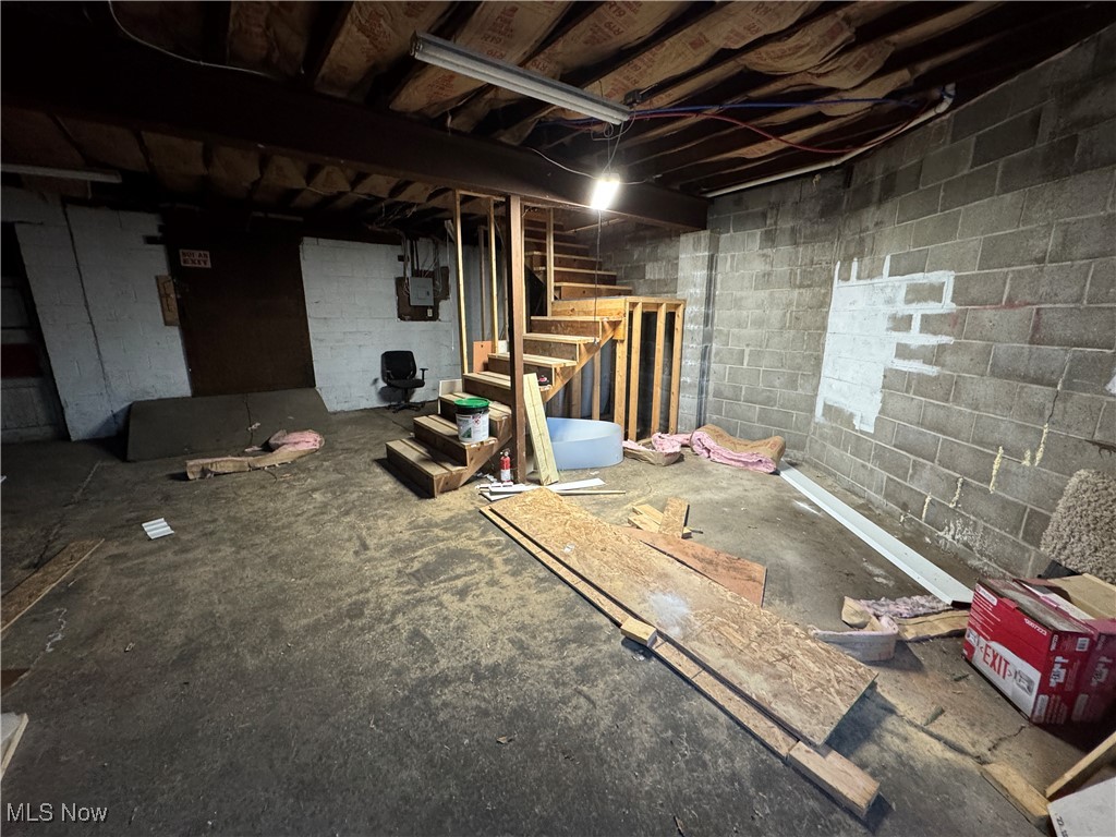 152 East Main Street Barnesville, OH 43713 - Photo 38 of 48 Unfinished basement with stairway