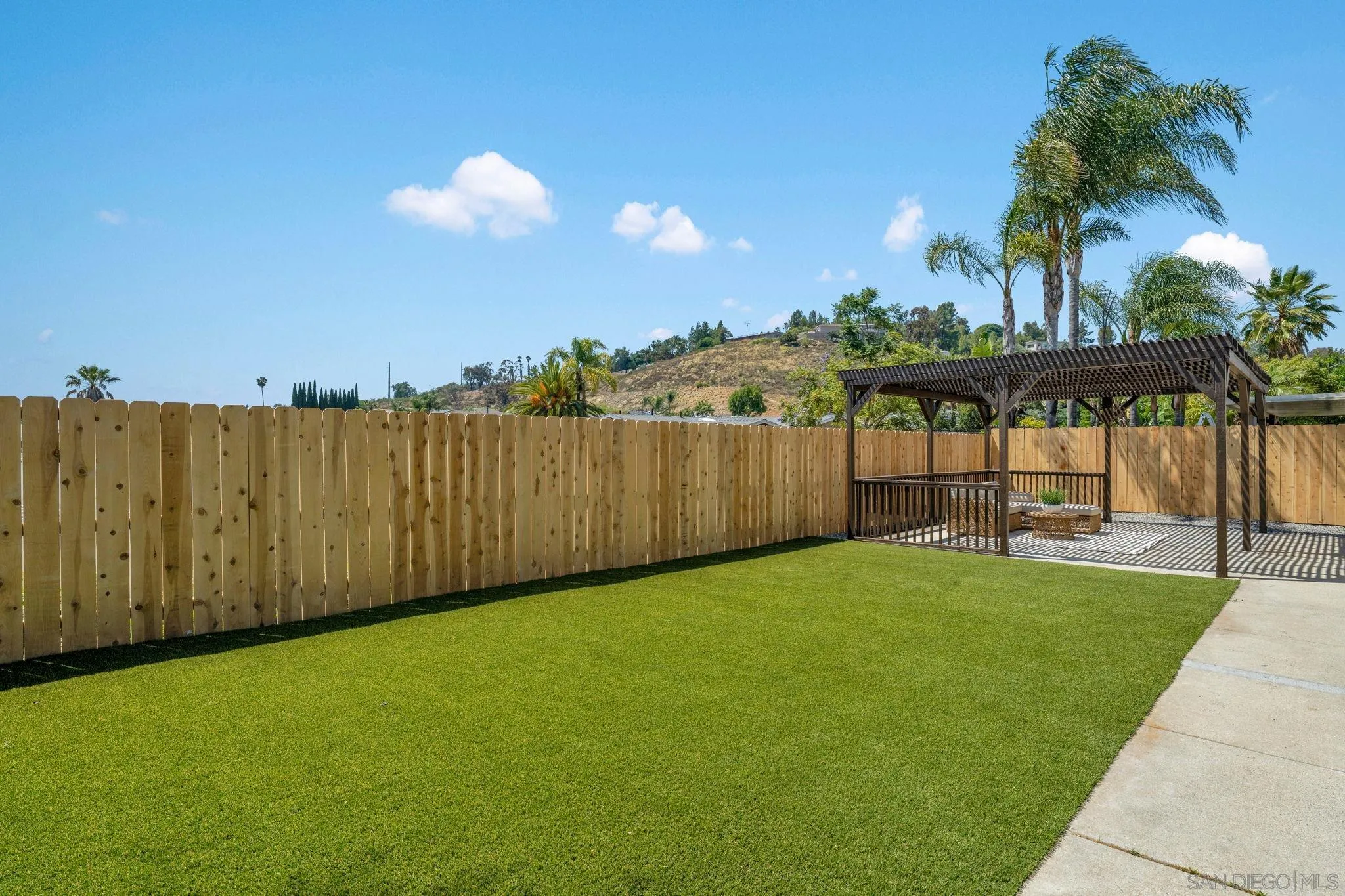13322 Via Mark Poway, CA 92064 - Photo 22 of 25 a view of a backyard with a garden