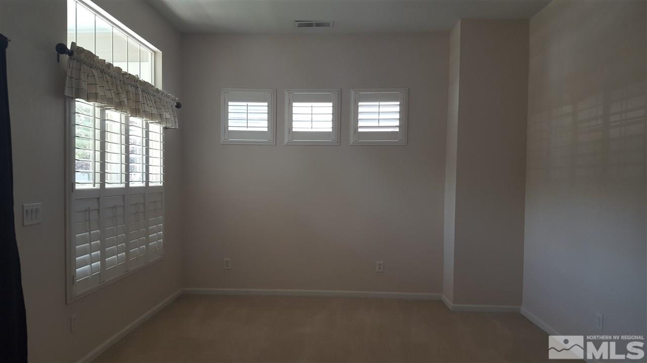 10281 Wolf Ridge Way Reno, NV 89521 - Photo 14 of 22 a small space with windows