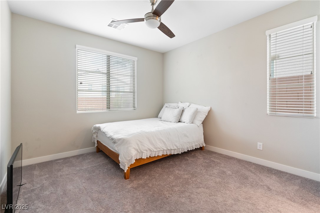 12 Papavero Court Henderson, NV 89011 - Photo 14 of 17 Bedroom featuring carpet floors and ceiling fan