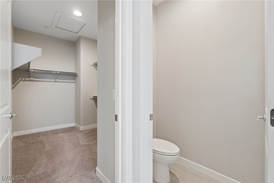 12 Papavero Court Henderson, NV 89011 - Photo 8 of 17 Bathroom with a spacious closet and baseboards