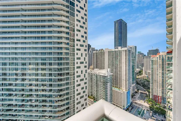 a view of a city with tall buildings